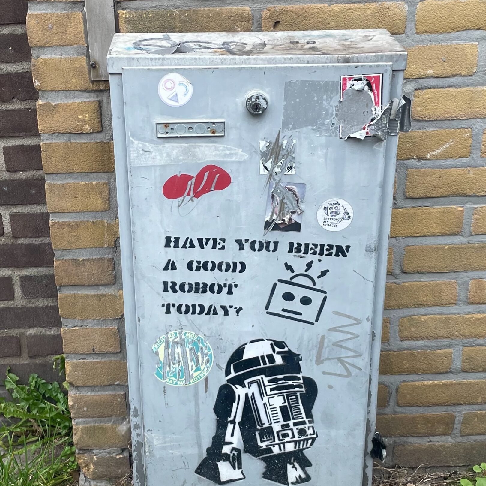Graffiti that asks if you have been a good robot today.